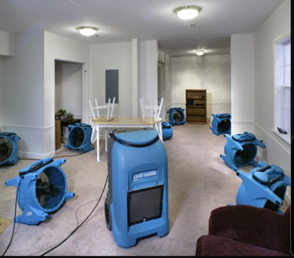 Air movers and dehumidifier setup for Water Extraction & Removal in Fresno
